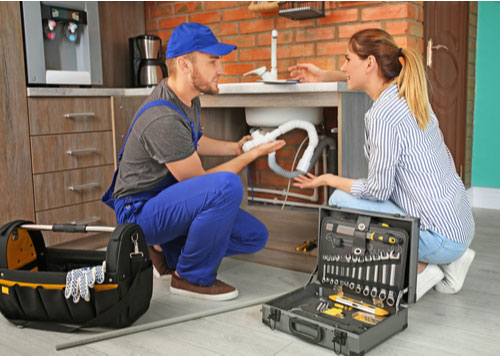 plumber installing kitchen sink, Hialeah residential plumbing services